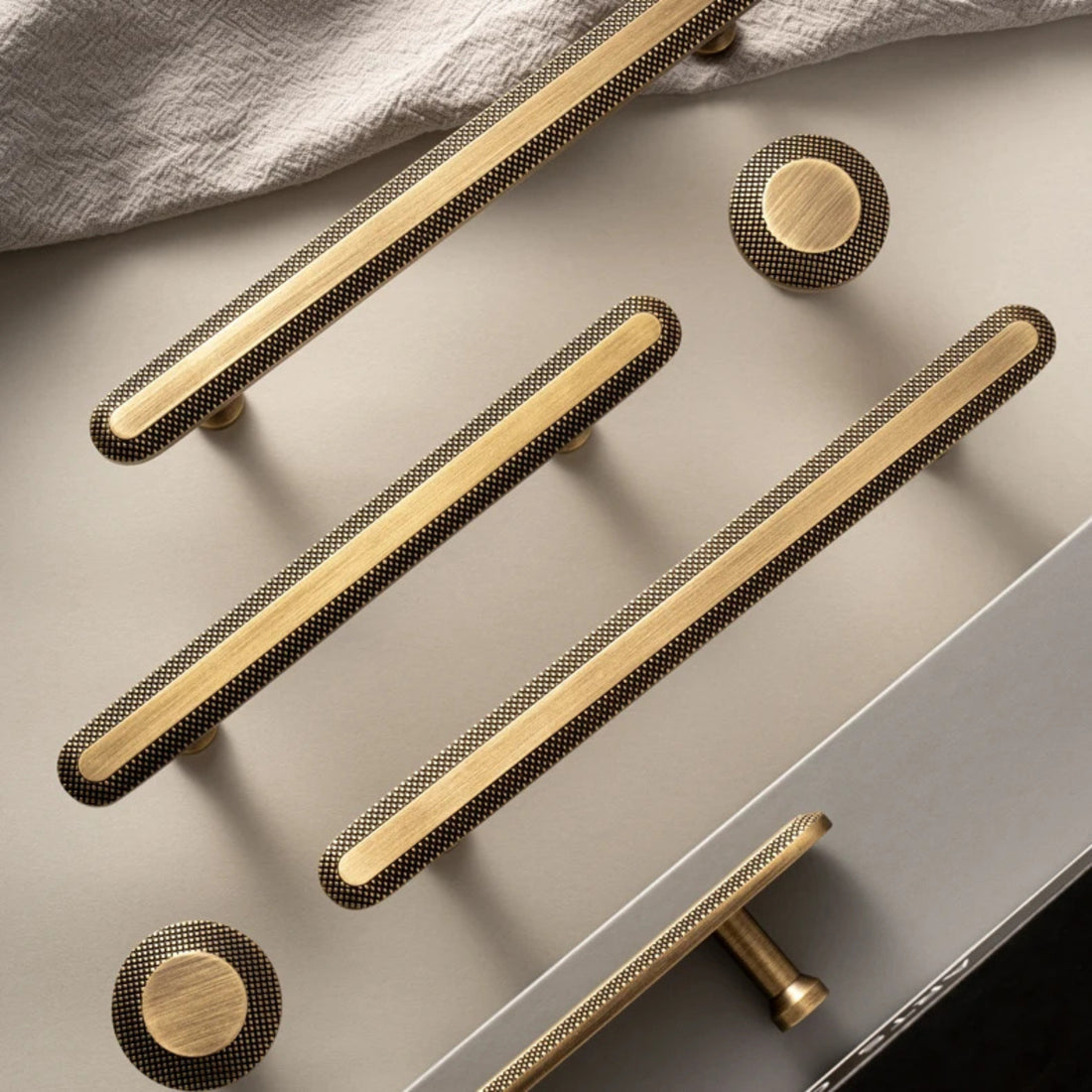 Knurled antique brass kitchen cabinet handle with grid texture
