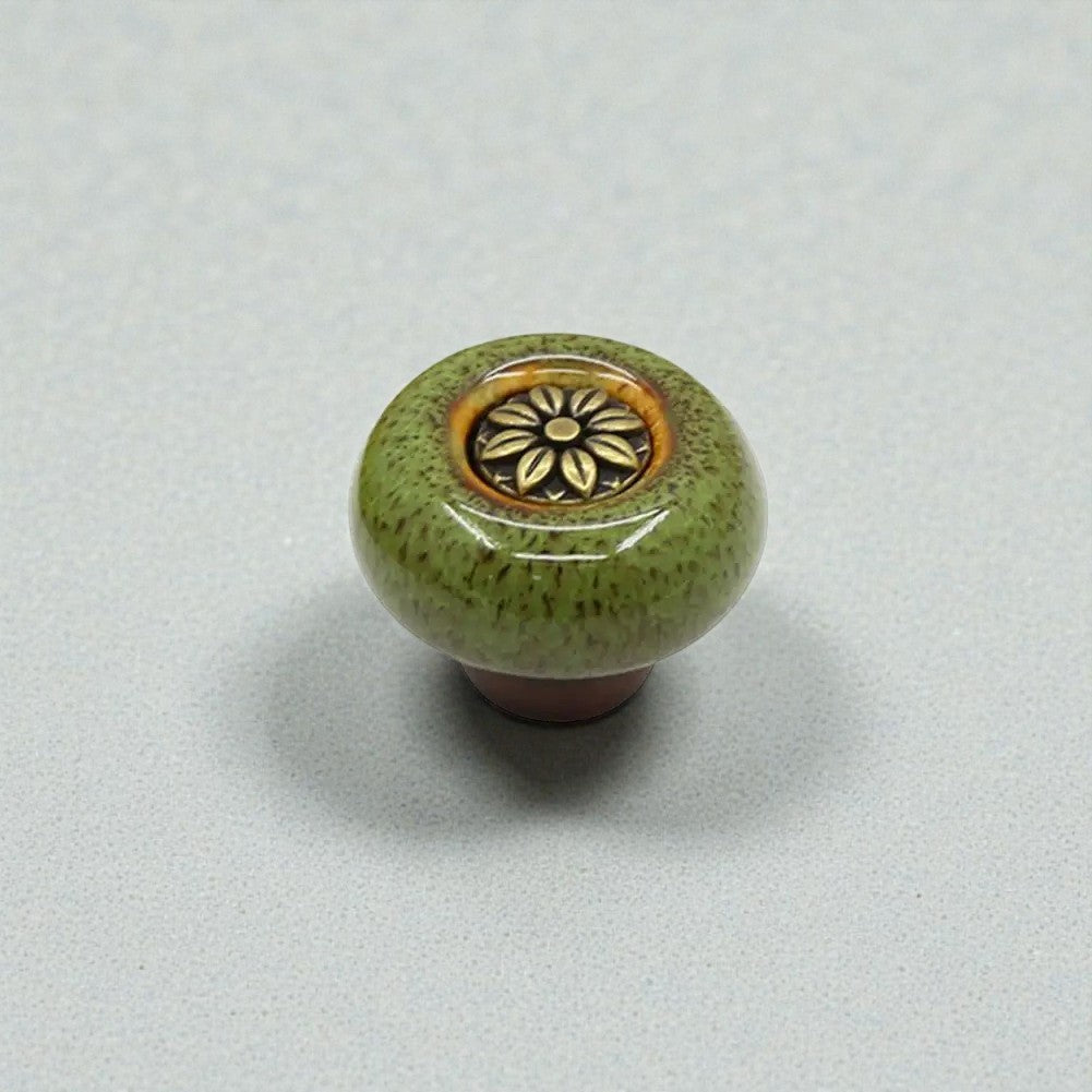 Close-up of hand-painted retro flower ceramic knob showing gold detailing